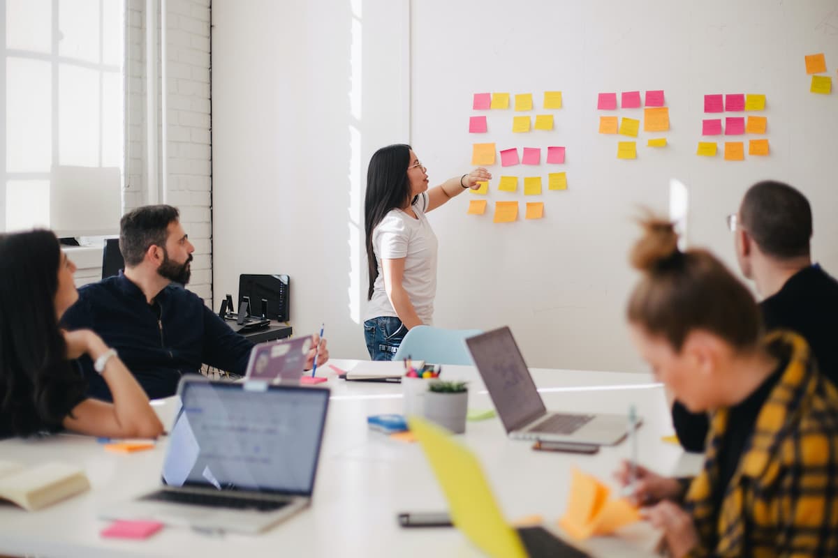 A team making decisions in a meeting together.